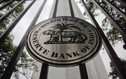 The Reserve Bank of India (RBI) logo is pictured outside its head office in Mumbai in this July 26, 2011, file photo. India's central bank left interest rates unchanged on March 15, 2012 and warned of resurgent inflation risks, a hawkish stance that disappointed investors clamoring for the first rate cut since the aftermath of the global financial crisis. REUTERS/Danish Siddiqui (INDIA - Tags: BUSINESS LOGO)