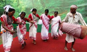 Asur, Man and Women from Jharkhand performed at Salt Lake FE block during Durga puja festival on Maha Sasthi, on Friday. Express photo by Subham Dutta. 07.10.16